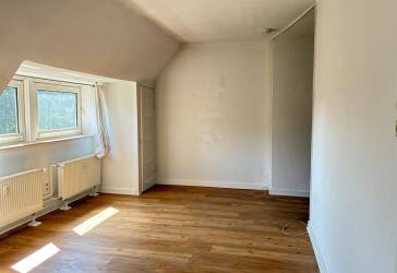 Herrliche Dachgeschosswohnung mit Balkon