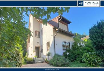 Lichtdurchflutetes Einfamilienhaus mit sonniger Terrasse und Garten in zentraler Wohnlage