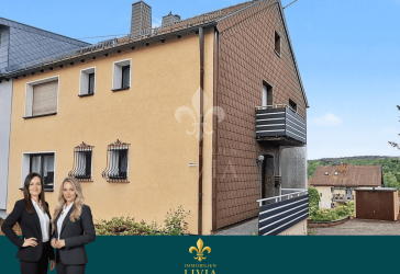 Charmantes Zweifamilienhaus auf gepflegtem Grundstück - ideal für Eigennutzer