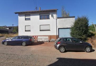 Viel Platz für neue Ideen: Mehrgenerationenhaus mit Garten und großer Garage