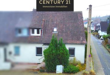 C21 Immovision: Sanierungsbedürftige Doppelhaushälfte in Neuhof