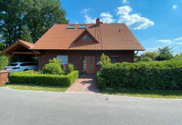 Familientraum im Grünen: Modernes Einfamilienhaus mit Traumgarten und viel Platz zum Wohlfühlen