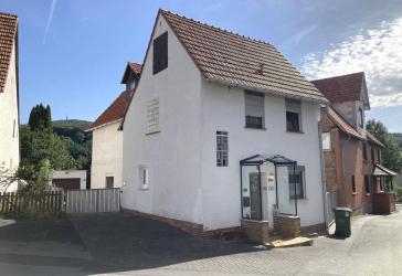 Charmantes Einfamilienhaus mit Garage und kleinem Garten in Liebenau-Lamerden