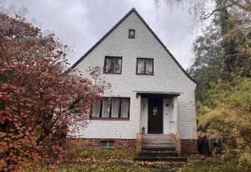 Einfamilienhaus in ruhiger Siedlungslage mit großem Grundstück