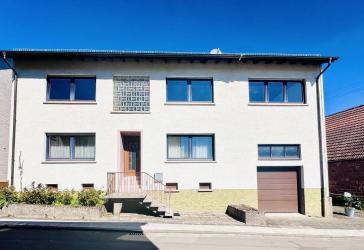 Queidersbach - Geräumiges Ein-/Zweifamilienhaus mit Garage und Garten