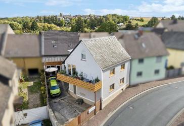 Arbeiten und Wohnen unter einem Dach - inkl. einem 3-FH als Kapitalanlage in Dauborn!!!