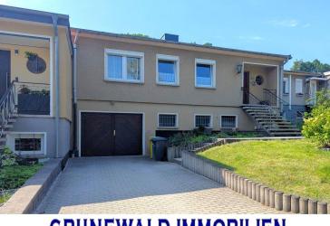 Reihenmittelhaus mit Garage, Hobbyraum und Südterrasse.