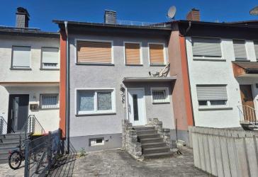 Charmantes Reihenmittelhaus mit Garten, ausgebautem Dachboden und moderner Terrasse