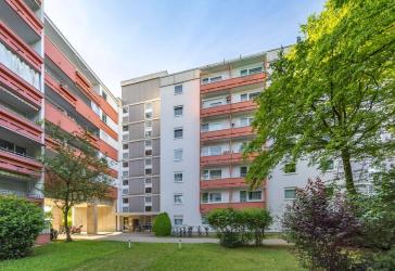 3-Zimmer-Wohnung mit Gartenanteil und Tiefgarage