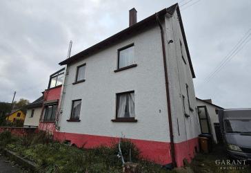 Einfamilienhaus mit Wintergarten und viel Potential