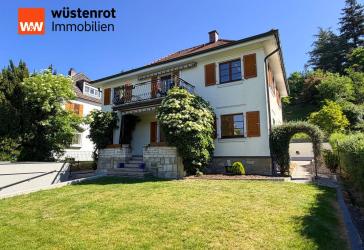 Wohnen mit Mehrwert: Gepflegtes Zweifamilienhaus in gefragter Lage mit Gartenidylle