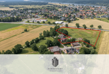 Mehrfamilienhaus mit vier Wohneinheiten, einer Gewerbeeinheit und 14.200 m2 Grundstücksfläche