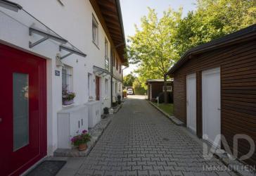 Investieren in Lebensqualität - Vermietetes Reihenmittelhaus in Oberhaching