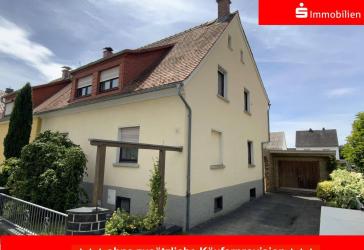 Mit Garten für junges Gemüse.
