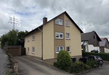 Püttlingen-Köllerbach: Attraktives 3-Familienhaus mit Garten, 2 Garagen und Stellplatz in guter Lage