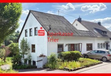 Charmante Doppelhaushälfte mit Wintergarten und weitläufigem Garten