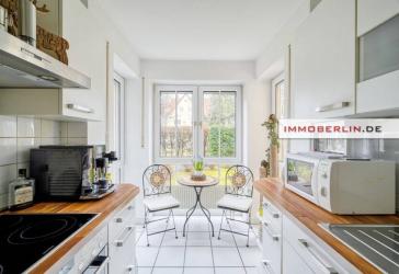 IMMOBERLIN.DE - Jung gebliebene Wohnung mit Südwestterrassen, Garten, geräumigem Garagenplatz