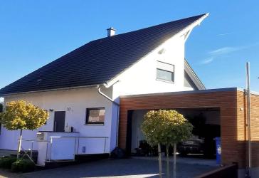 Exklusives Wohnhaus mit Einliegerwohnung, Wintergarten & großem Garten – provisionsfrei