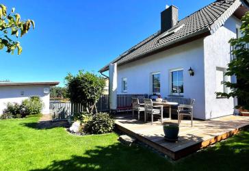Exklusives Wohnerlebnis mit moderner Ausstattung, Traumgarten und Einliegerwohnung!