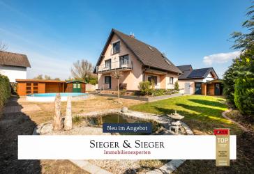 Wohnen mit Freiraum - charmantes freistehendes Ein oder Zweifamilienhaus mit großem Garten und Pool