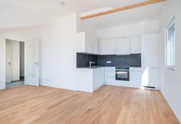 MAIER - Neubau bezugsfertig: 2-Zi-DG-Balkon-WHG mit EBK, TG und Aufzug - WE 9