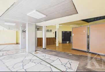 Zentrale Gewerbeimmobilie mit Wohnbereich - Sichtbarkeit und Potenzial in Heusweiler
