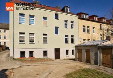 Ertragssicheres Mehrfamilienhaus in Bad Freienwalde: 6 Einheiten & Garagen als solide Kapitalanlage