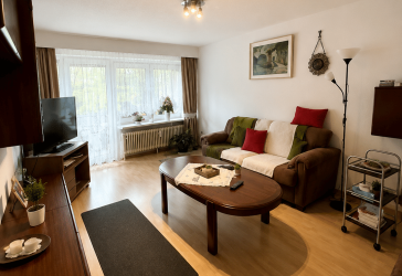 Einladende 3,5-Zimmer-Wohnung im UG mit Balkon - modern und charmant!