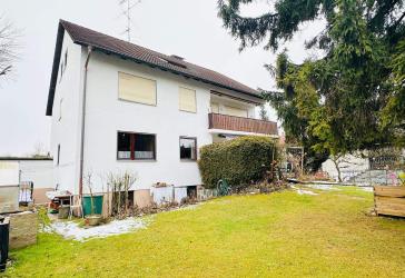 Gepflegtes Mehrfamilienhaus mit Süd-West-Garten in ruhiger Bestlage