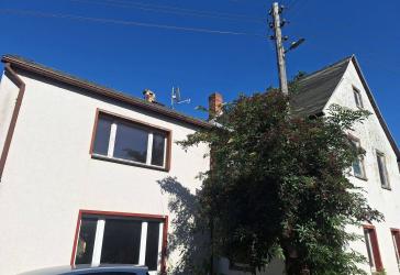 Handwerkerhaus im Rohbauzustand mit Nebengelass und Garage!