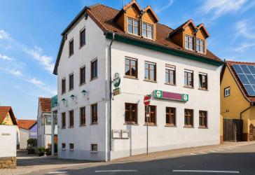 Kriegsfeld | Wohn- und Geschäftshaus mit vermieteten Wohneinheiten und freier Erdgeschossfläche