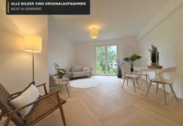 Erstbezug nach Sanierung: Großzügige 4,5-Raum-Familienwohnung mit Balkon & Fischgrätparkett