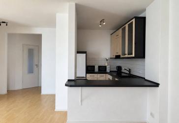 Lichtdurchflutete 2-Zimmer-Wohnung mit Südterrasse über den Dächern von Langen