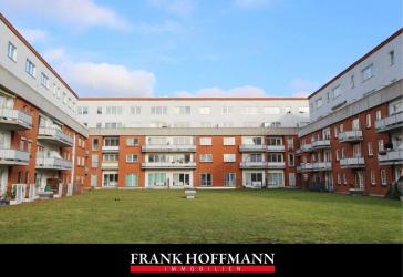 Kapitalanlage in Kaltenkirchen - Vermietete Wohnung über 2 Ebenen mit Kamin, Aufzug und Tiefgarage