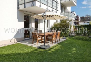 Lichtdurchflutete 3-Zi.-EG-Wohnung mit Terrasse und Gartenanteil