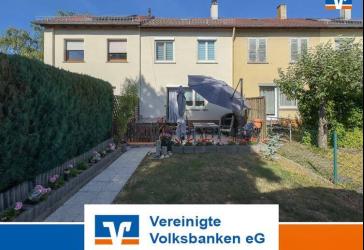 Gepflegtes Reihenmittelhaus mit Garten und Garage zu verkaufen!