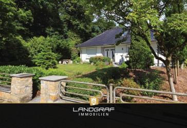 Naturnah wohnen: Einfamilien-Bungalow mit Sauna, Keller und Doppel-Tiefgarage!