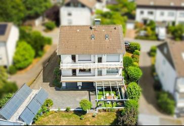 Vielseitiges Mehrfamilienhaus mit 3 WEs, großzügigem Garten und attraktiven Nutzungsmöglichkeiten
