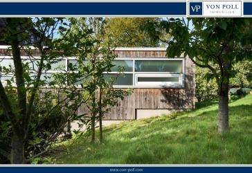 Ein Zuhause zum Verlieben - Freistehendes Einfamilienhaus mit Einliegerwohnung und Traumgarten
