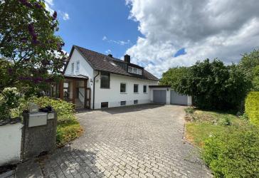 Ein Zuhause mit Freiraum: Zweifamilienhaus auf traumhaft großem Gartengrundstück!