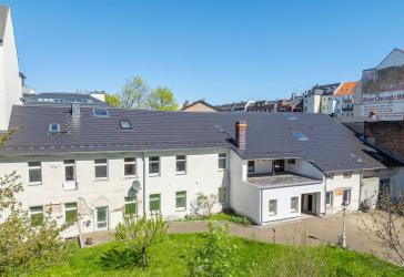 Einzigartig wohnen. Vielseitig nutzen. Historisches Wohn- & Geschäftshaus mit Seltenheitswert