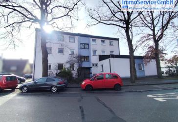 4-Familienhaus und Bankgebäude, aufgeteilt nach WEG, Garagen, Stellplätze,...
