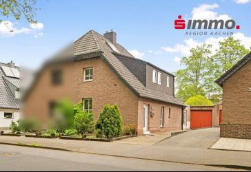 Ruhig gelegene DHH mit Wintergarten, Garage und Garten