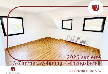 Stilvoll wohnen unter dem Dach – hochwertig sanierte 3-Zimmer-Wohnung in gepflegtem Vierparteienhaus
