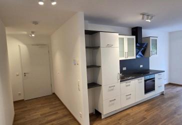 Neubau - Erstbezug - sofort verfügbar! Exklusive 2-Zi-Wohnung mit EBK und Garten sowie Tiefgarage