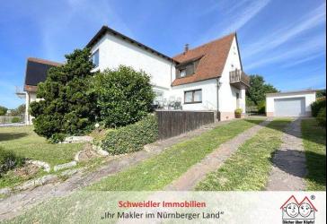 Alleskönner in Heuchling! 2-Familienhaus mit schönem Grundstück & Garage in begehrter Lage von Lauf