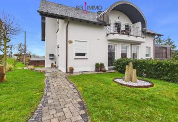 Stilvolle Wohnidylle mit Fernblick - Hochwertiges Einfamilienhaus mit Einliegerwohnung, Erdwärme und traumhafter Aussicht