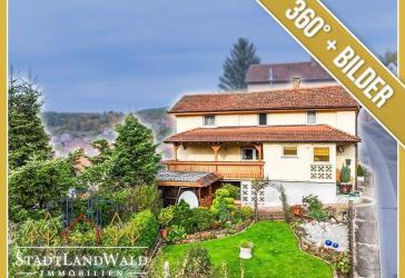 Viel Platz mit Aussicht - Einfamilienhaus mit Garten, Balkonen & Garagen in Bundenthal