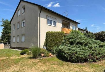 Mehrfamilienhaus mit 5 Wohnungen und 3 Garagen in der alten Buchenau