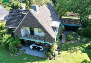 Wohnen mit Stil - markantes Architektenhaus mit Turmerker und Wintergarten